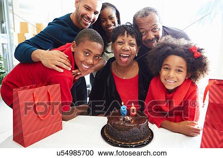 Family Celebrating 60th Birthday Together View Large Photo Image Stock Image - Family Celebrating 60th Birthday Together. Fotosearch