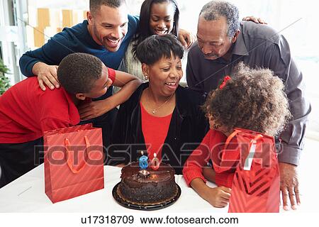 Family Celebrating 60th Birthday Together View Large Photo Image Stock Photo - Family Celebrating 60th Birthday Together. Fotosearch