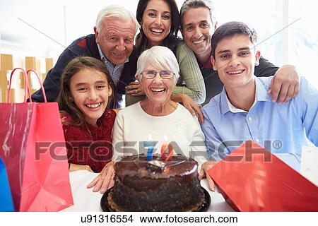 Family Celebrating 70th Birthday Together View Large Photo Image Picture - Family Celebrating 70th Birthday Together. Fotosearch