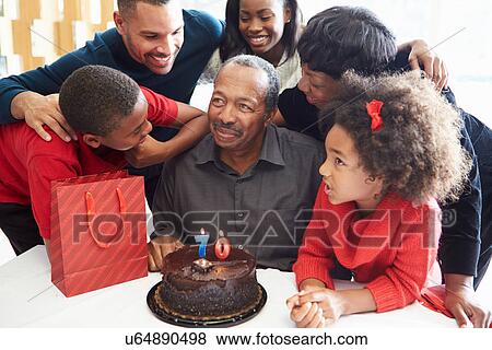 Family Celebrating 70th Birthday Together View Large Photo Image Stock Photo - Family Celebrating 70th Birthday Together. Fotosearch