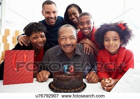 Family Celebrating 70th Birthday Together View Large Photo Image Stock Photo - Family Celebrating 70th Birthday Together. Fotosearch
