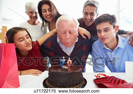 Family Celebrating 70th Birthday Together View Large Photo Image Stock Photography - Family Celebrating 70th Birthday Together. Fotosearch