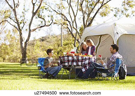 Family Enjoying Camping Holiday In Countryside View Large Photo Image Stock Image - Family Enjoying Camping Holiday In Countryside. Fotosearch
