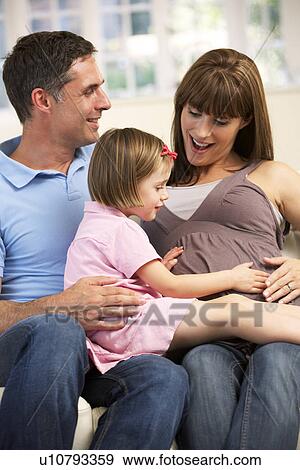 Stock Photo - Family expecting new baby. Fotosearch