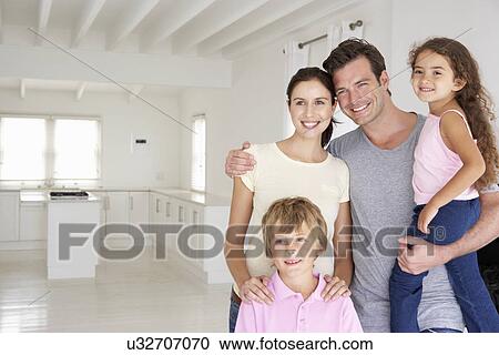 Family in new home View Large Photo Image Stock Image - Family in new home. Fotosearch