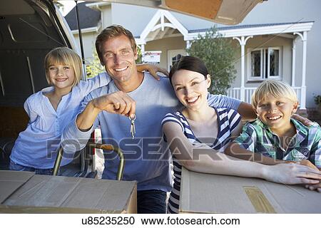 Family moving house View Large Photo Image Stock Image - Family moving house. Fotosearch