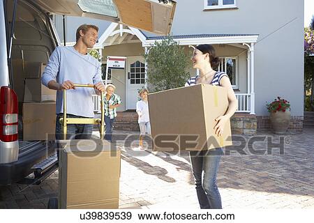 Family moving house View Large Photo Image Stock Photo - Family moving house. Fotosearch