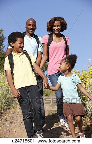 Stock Image - Family on country hike. Fotosearch