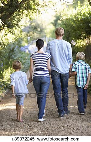 Family on country walk View Large Photo Image Stock Photography - Family on country walk. Fotosearch