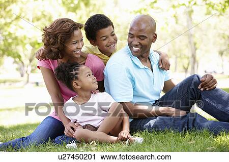Family portrait in park View Large Photo Image Stock Image - Family portrait in park. Fotosearch