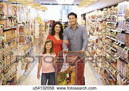 Family shopping in supermarket View Large Photo Image Stock Photo - Family shopping in supermarket. Fotosearch