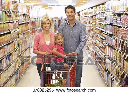 Stock Photography - Family shopping in supermarket. Fotosearch