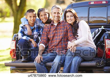 Family Sitting In Pick Up Truck On Camping Holiday View Large Photo Image Stock Image - Family Sitting In Pick Up Truck On Camping Holiday. Fotosearch