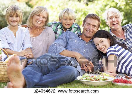 Family with picnic in park View Large Photo Image Stock Image - Family with picnic in park. Fotosearch