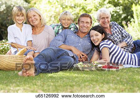 Family with picnic in park View Large Photo Image Stock Image - Family with picnic in park. Fotosearch