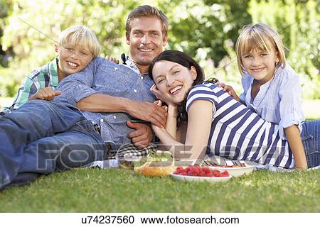 Family with picnic in park View Large Photo Image Stock Image - Family with picnic in park. Fotosearch