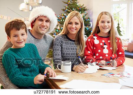 Family Writing Christmas Cards Together View Large Photo Image Stock Image - Family Writing Christmas Cards Together. Fotosearch