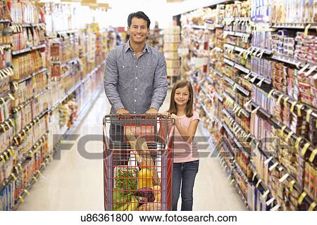 Father and daughter shopping in supermarket View Large Photo Image Stock Image - Father and daughter shopping in supermarket. Fotosearch