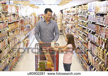 Father and daughter shopping in supermarket View Large Photo Image Stock Image - Father and daughter shopping in supermarket. Fotosearch