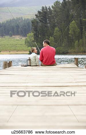 Stock Photograph - Father and son fishing. Fotosearch