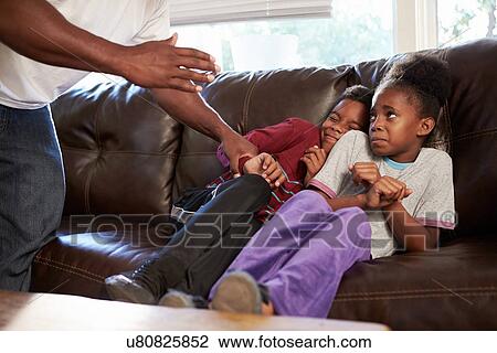Father Being Physically Abusive Towards Children At Home View Large Photo Image Stock Image - Father Being Physically Abusive Towards Children At Home. Fotosearch
