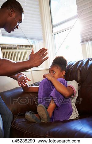 Father Being Physically Abusive Towards Daughter At Home View Large Photo Image Stock Photo - Father Being Physically Abusive Towards Daughter At Home. Fotosearch