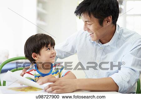 Father Helping Son With Homework View Large Photo Image Stock Image - Father Helping Son With Homework. Fotosearch