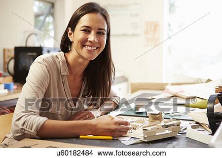 Picture - Female Architect Making Model In Office. Fotosearch