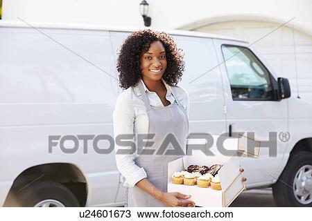 Female Baker Delivering Cakes Standing In Front Of Van View Large Photo Image Stock Image - Female Baker Delivering Cakes Standing In Front Of Van. Fotosearch