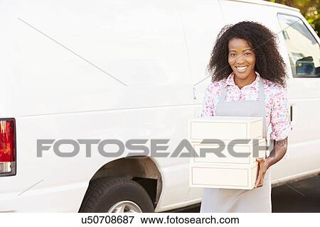 Female Baker Unloading Cakes From Van View Large Photo Image Stock Photo - Female Baker Unloading Cakes From Van. Fotosearch