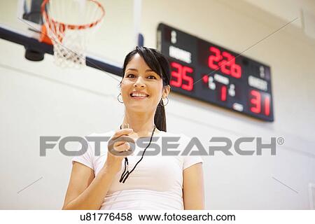 Female Coach Of High School Basketball Team View Large Photo Image Stock Photo - Female Coach Of High School Basketball Team. Fotosearch