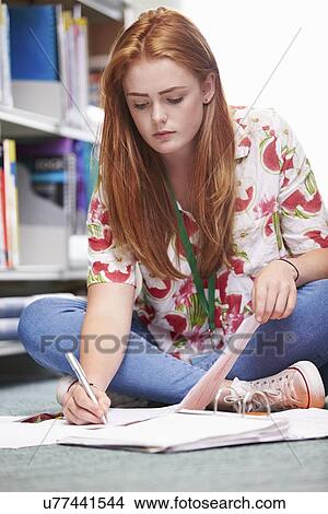 Female College Student Studying In Library View Large Photo Image Picture - Female College Student Studying In Library. Fotosearch