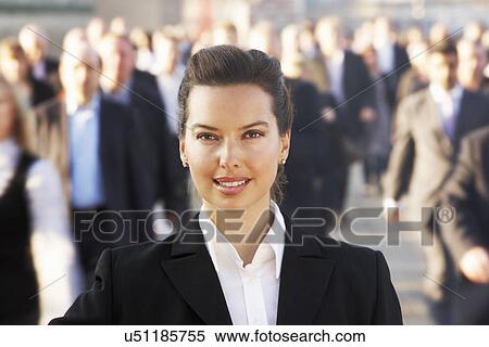 Female commuter in crowd View Large Photo Image Stock Photography - Female commuter in crowd. Fotosearch