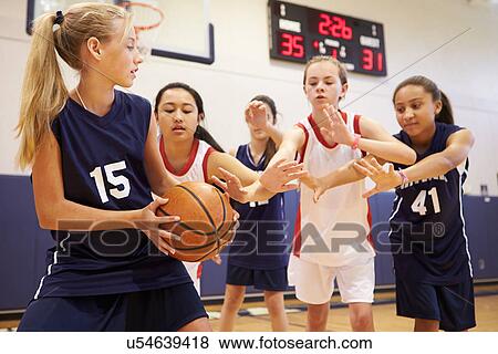 Female High School Basketball Team Playing Game View Large Photo Image Stock Photo - Female High School Basketball Team Playing Game. Fotosearch