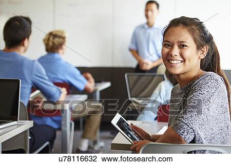 Female High School Student Digital Tablet In Classroom View Large Photo Image Stock Image - Female High School Student Digital Tablet In Classroom. Fotosearch