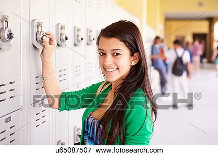 Female High School Student Opening Locker View Large Photo Image Stock Photo - Female High School Student Opening Locker. Fotosearch