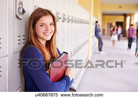Female High School Student Standing By Lockers View Large Photo Image Stock Photography - Female High School Student Standing By Lockers. Fotosearch