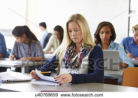 Female High School Student Studying At Desk View Large Photo Image Stock Photo - Female High School Student Studying At Desk. Fotosearch