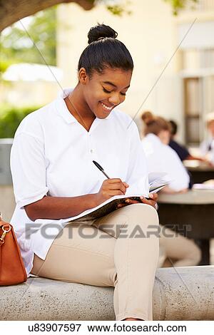 Female High School Student Wearing Uniform On School Campus View Large Photo Image Stock Photo - Female High School Student Wearing Uniform On School Campus. Fotosearch