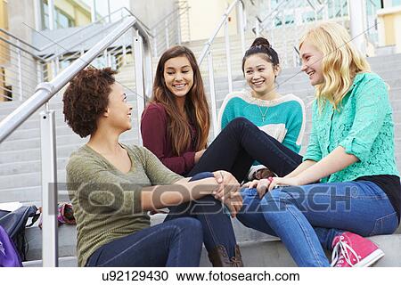 Female High School Students Sitting Outside Building View Large Photo Image Stock Image - Female High School Students Sitting Outside Building. Fotosearch