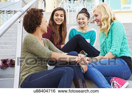 Female High School Students Sitting Outside Building View Large Photo Image Stock Photograph - Female High School Students Sitting Outside Building. Fotosearch