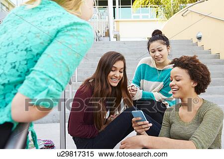 Female High School Students Sitting Outside Building View Large Photo Image Stock Photography - Female High School Students Sitting Outside Building. Fotosearch
