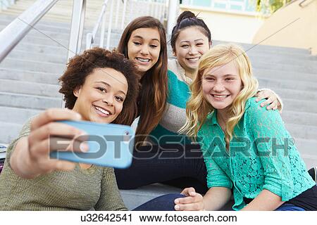 Female High School Students Taking Selfie Photograph View Large Photo Image Stock Image - Female High School Students Taking Selfie Photograph. Fotosearch