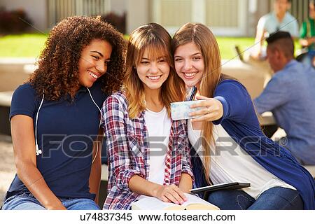 Female High School Students Taking Selfie On Campus View Large Photo Image Stock Photography - Female High School Students Taking Selfie On Campus . Fotosearch