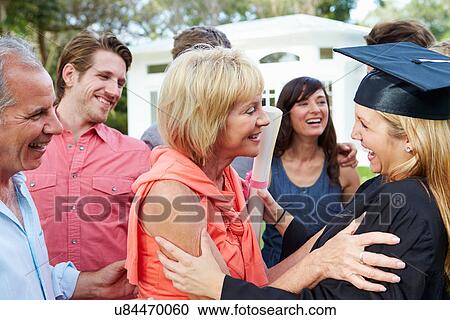 Female Student And Family Celebrating Graduation View Large Photo Image Stock Image - Female Student And Family Celebrating Graduation. Fotosearch