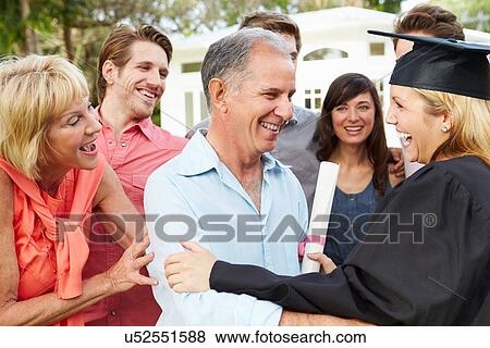 Female Student And Family Celebrating Graduation View Large Photo Image Stock Photo - Female Student And Family Celebrating Graduation. Fotosearch
