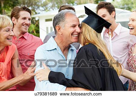 Stock Photo - Female Student And Family Celebrating Graduation. Fotosearch