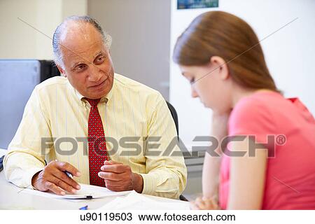 Female Student Talking To High School Counselor View Large Photo Image Stock Image - Female Student Talking To High School Counselor. Fotosearch