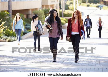 Female Students Walking Outdoors On University Campus View Large Photo Image Stock Image - Female Students Walking Outdoors On University Campus. Fotosearch