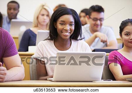 Female University Student Using Laptop In Lecture View Large Photo Image Stock Image - Female University Student Using Laptop In Lecture. Fotosearch